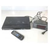 DVD player by Craig. With remote untested. And