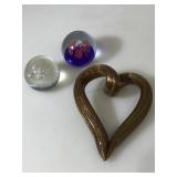 2 glass paperweights and a heart-shaped