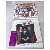 2 albums, sealed. One is " the best of Comic