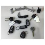 Lot of assorted car keys and more