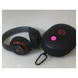 Beats  headphones with case and no charging cord.