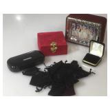 Assortment of empty glasses case, two