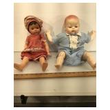 Vintage jointed composition girl doll in pink,