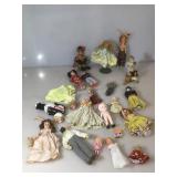 Lot of assorted vintage small dolls. Many