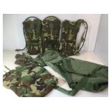 3 Camo Camelbaks, camo pants Size M and more.