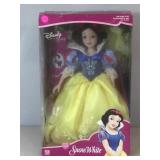 18 inches tall porcelain Snow White doll. NIB.