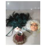2 female wall masks and a vintage red lampshade,