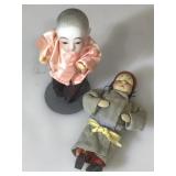 2 vintage oriental 7 inch character dolls ,