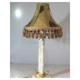 Carved lamp with shade