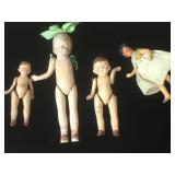 4 vintage jointed dolls , tallest 7 inches, one