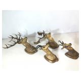 Lot of deer mounts. Resin wall hangings. Some