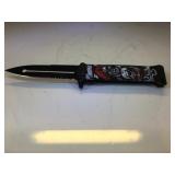 Skull pocket knife. Case is cracked.4in.blade.