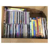 Box of CDs and DVDs