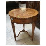 Round wooden end table, approx 22x29 inches