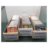 3 boxes of sports cards in sleeves with stars