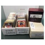 3 boxes of sports cards some in sleeves with