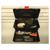 Gun cleaning supplies in plastic toolbox