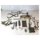 Primitive items for display. Hay Picks, horse