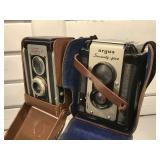 Two vintage box cameras. Argus and Kodak.