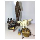 Assorted wooden and resin sculptures.Carved