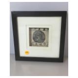 Framed African small sculptured deity,  framed to