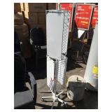 Double rotating metal rack - approx. 5 feet tall