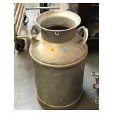 Metal milk can marked Clark CO Dairy Men