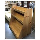 Wooden rolling magazine rack, approx 45x47 inches