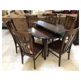 Wooden round dining table w/leaf and 6 chairs,