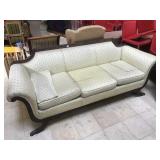 Vintage sofa w/wooden frame and carved legs,