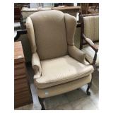 Armchair w/wooden legs and square print