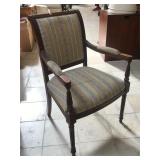 Vintage wooden arm chair w/padded arm and stud