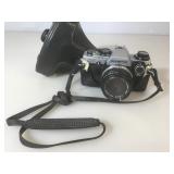 Olympus OM10 35Mm camera with case.