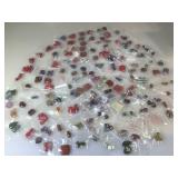 Assorted beads and stones for jewelry making.