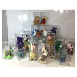 Assorted Beanie Babies in display cases.