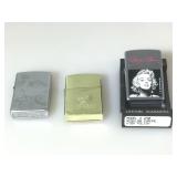 Three Zippo Lighters. Marilyn Monroe still in OP.