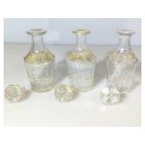 Set of 3 glass decanters w/golden accents, approx