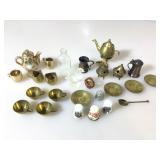 Miniatures in Brass, Ceramic and glass.