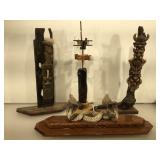 4 unique decorative pieces on wood stands, damage