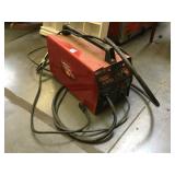 Lincoln Electric Welder, has a dent on the side
