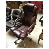 Brown rolling office chair