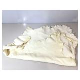 Median size of white leather piece, approx 25x34