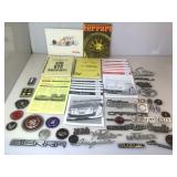 Lot of assorted car emblems and more
