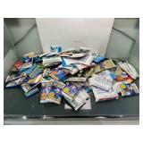 Huge lot of sealed packs of sports cards