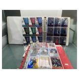 2 albums of basketball cards with stars and