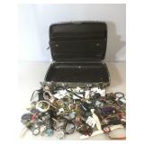 Briefcase filled with watches and costume jewelry