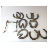 Primitives. Horseshoes and bit.