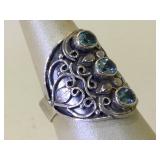 Sterling Silver ring with light blue stones -