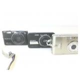Three Point and Shoot Cameras. Nikon, FujiFilm