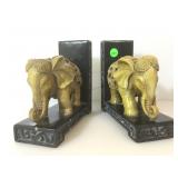 Pair of carved Elephant book ends, approx 7x7